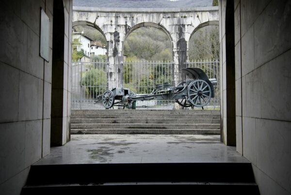 historic cannon at military memorial in italy